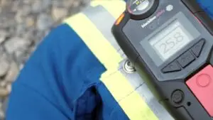 close up image of a blackline safety device on a man